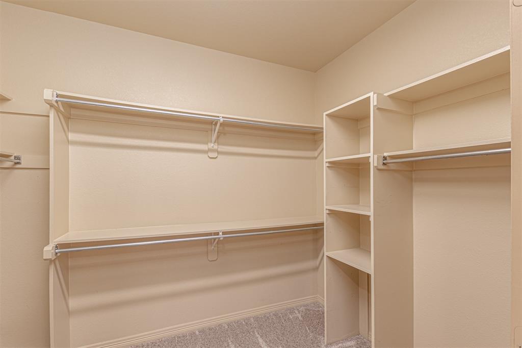 1871 Signal Ridge Place Rockwall, TX 75032 - Photo 19 of 26 a view of an empty walk in closet