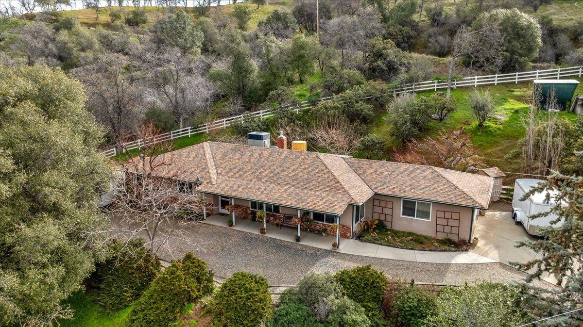 46473 Konklin Road Coarsegold, CA 93614 - Photo 1 of 38 an aerial view of a house with swimming pool and patio