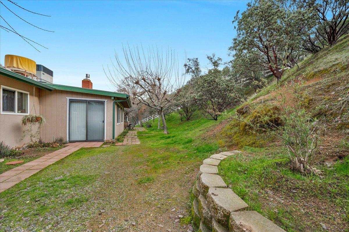 46473 Konklin Road Coarsegold, CA 93614 - Photo 25 of 38 a view of a house with a yard and tree s