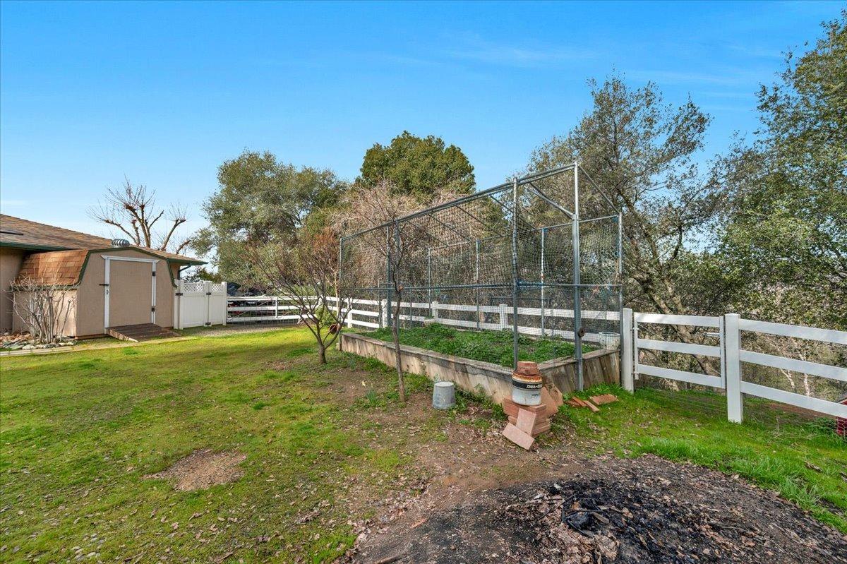 46473 Konklin Road Coarsegold, CA 93614 - Photo 29 of 38 a view of a house with a yard