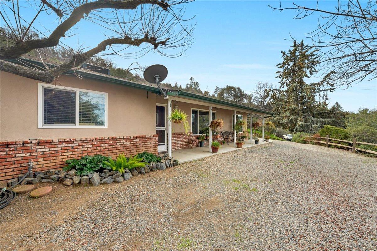 46473 Konklin Road Coarsegold, CA 93614 - Photo 3 of 38 a view of a house with a patio