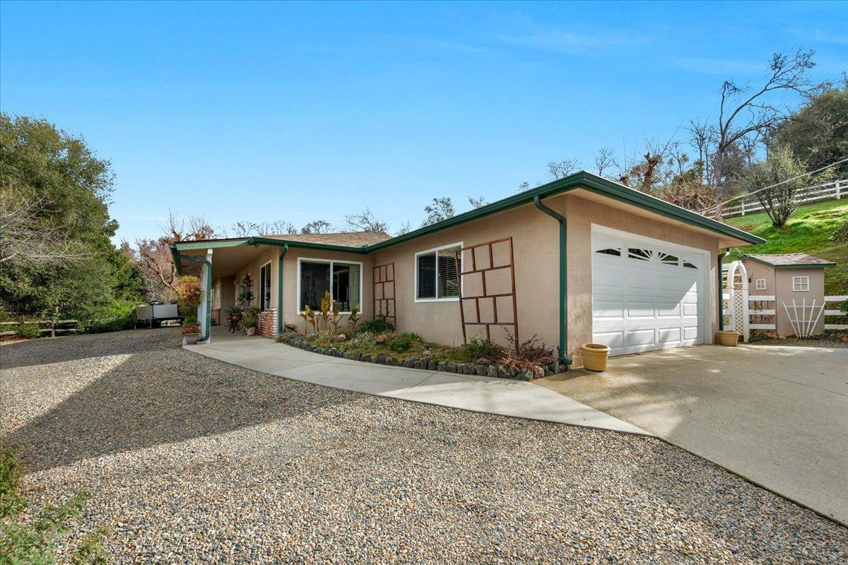 46473 Konklin Road Coarsegold, CA 93614 - Photo 5 of 38 a view of a house with a yard