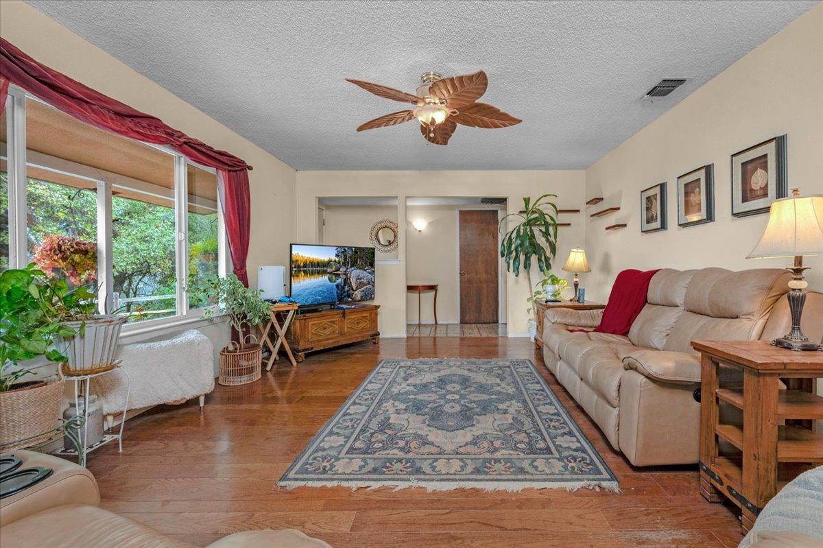 46473 Konklin Road Coarsegold, CA 93614 - Photo 7 of 38 a living room with furniture and a large window