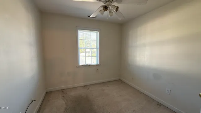 an empty room with a window