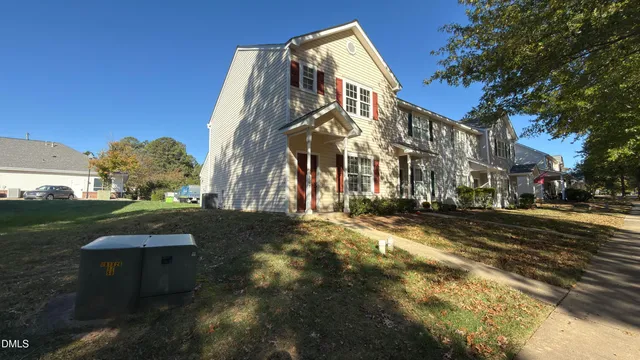 a view of a street with houses