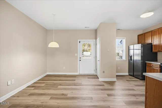 a view of a livingroom with wooden floor