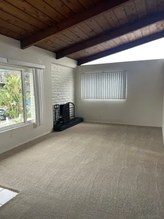 a kitchen with appliances cabinets and a sink