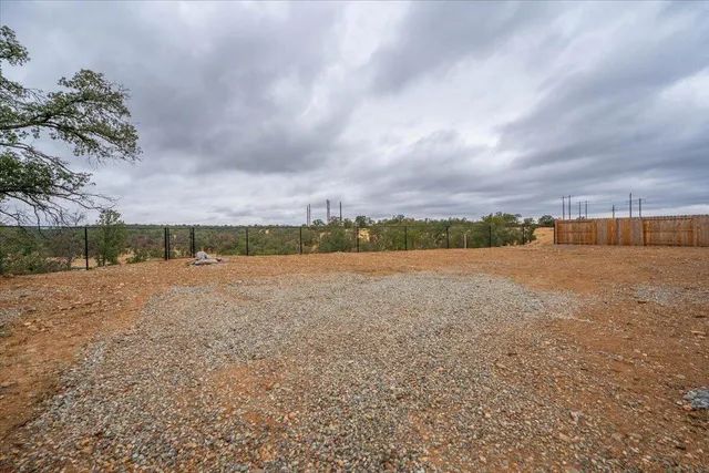 a view of lake with mountain in the background