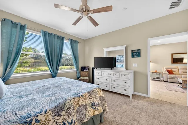 a bathroom with a tub a sink and a shower