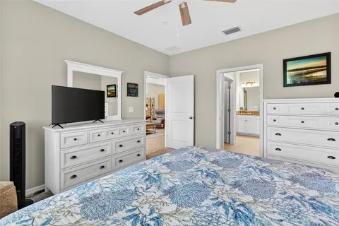 a view of a porch with furniture and garden