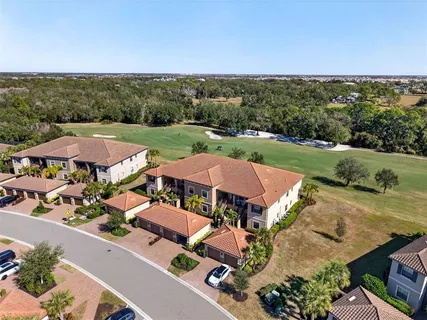 a view of a porch with a potted plant on a table