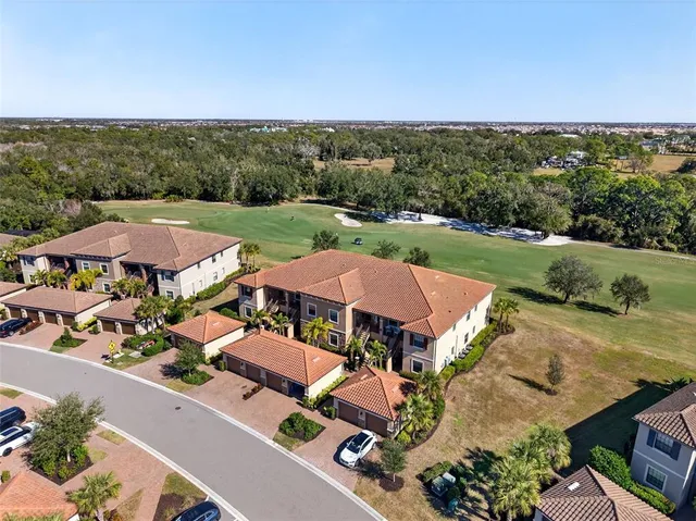 a view of a porch with a potted plant on a table