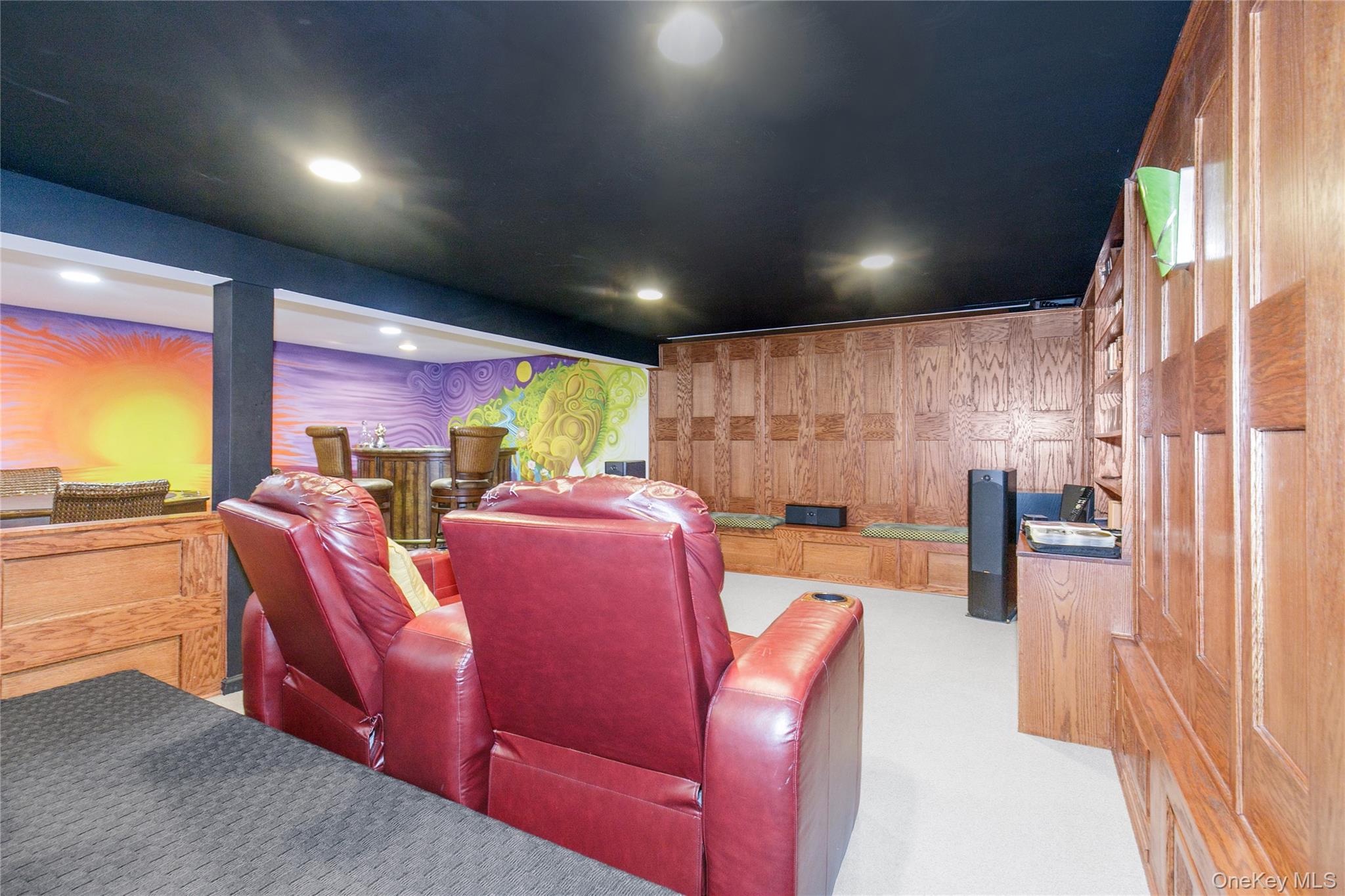 5 Searington Drive Syosset, NY 11791 - Photo 29 of 34 a living room with furniture a ceiling fan and a large window