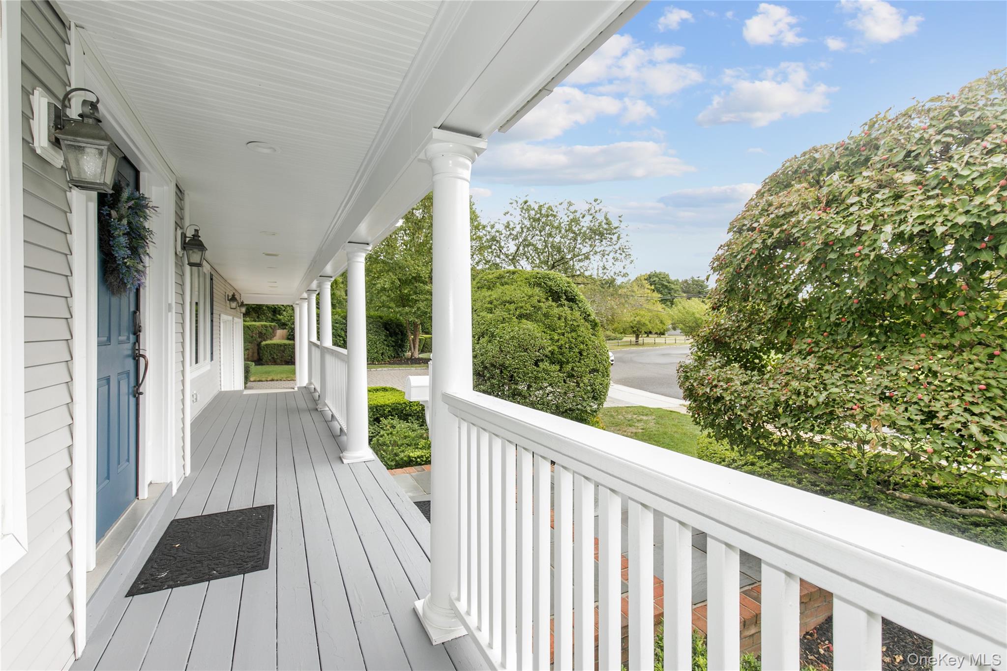 5 Searington Drive Syosset, NY 11791 - Photo 5 of 34 a view of balcony with wooden floor