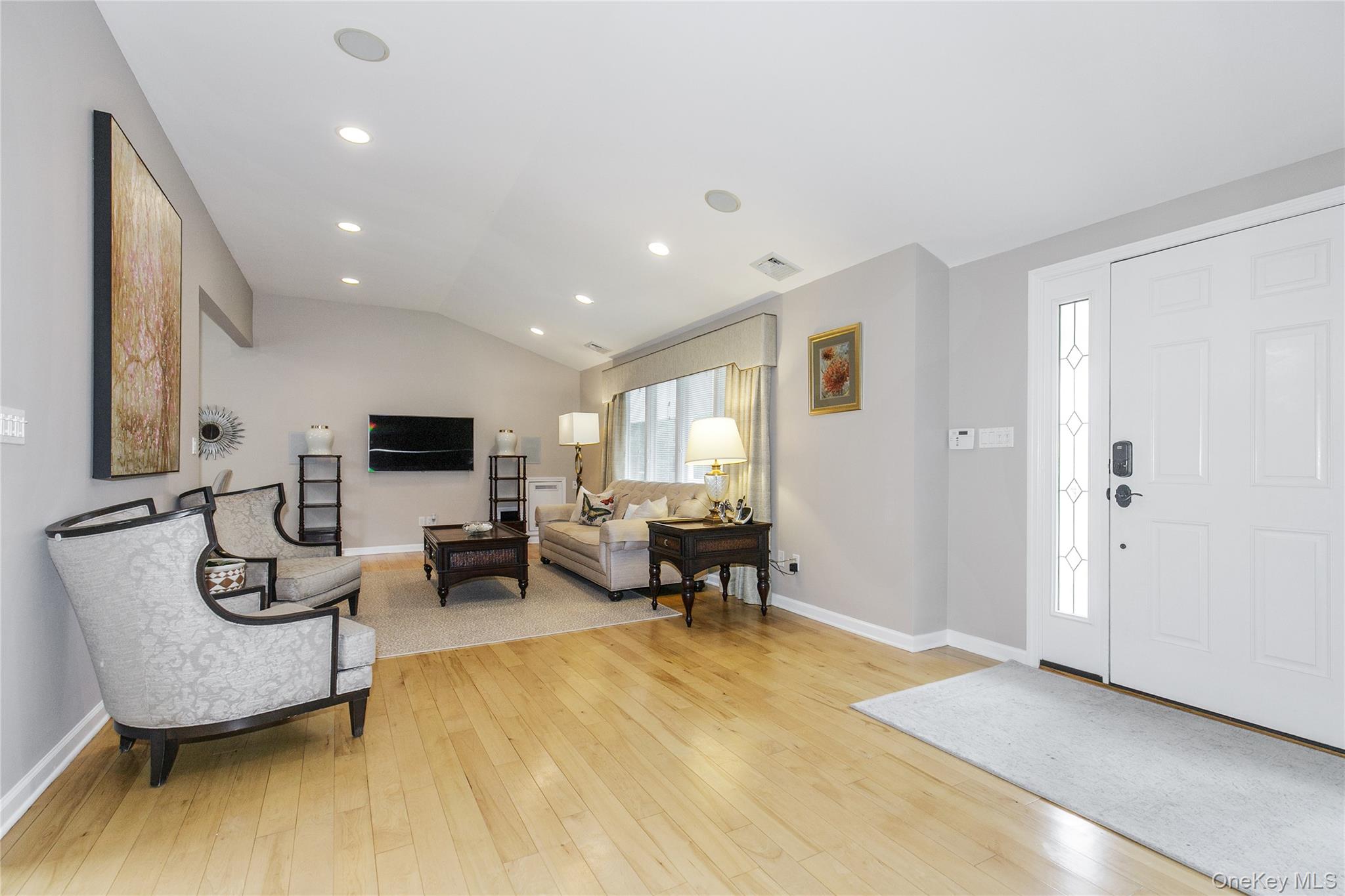 5 Searington Drive Syosset, NY 11791 - Photo 6 of 34 a living room with furniture and a flat screen tv