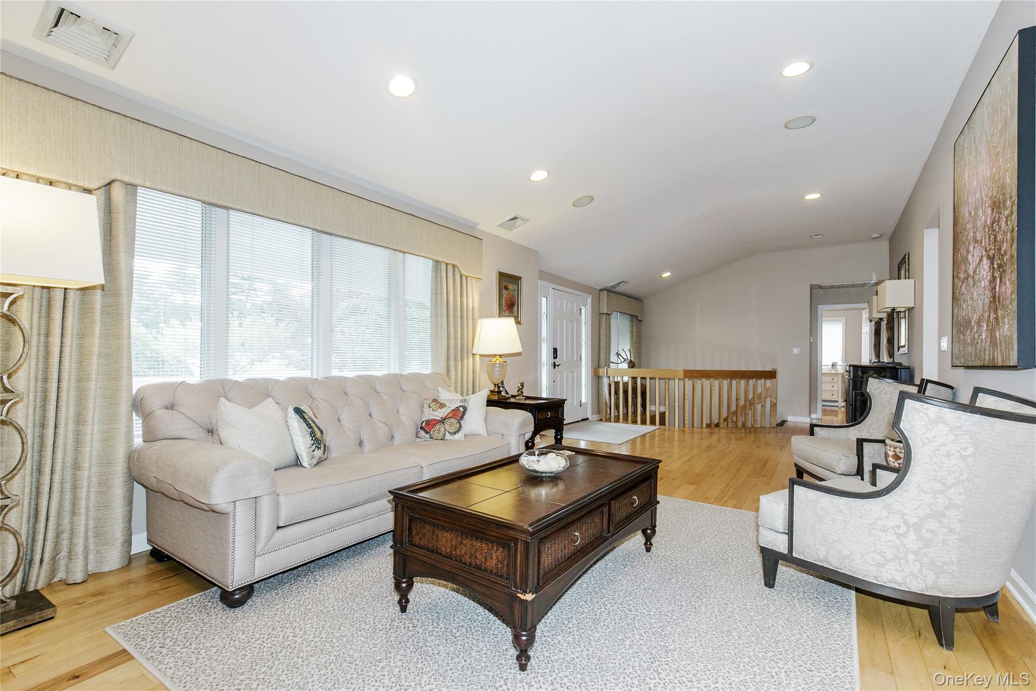5 Searington Drive Syosset, NY 11791 - Photo 7 of 34 a living room with furniture and a large window