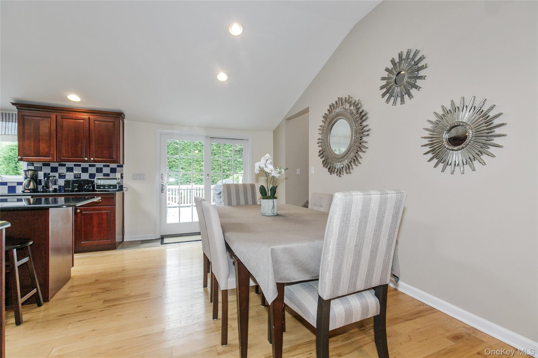 5 Searington Drive Syosset, NY 11791 - Photo 10 of 34 a view of a dining room with furniture and wooden floor