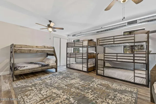 a bedroom with a bed and a walk in closet