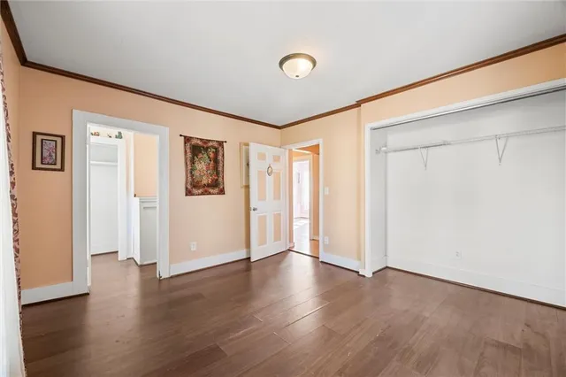 a view of a livingroom with wooden floor