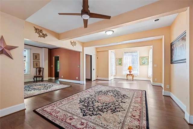 a living room with a rug
