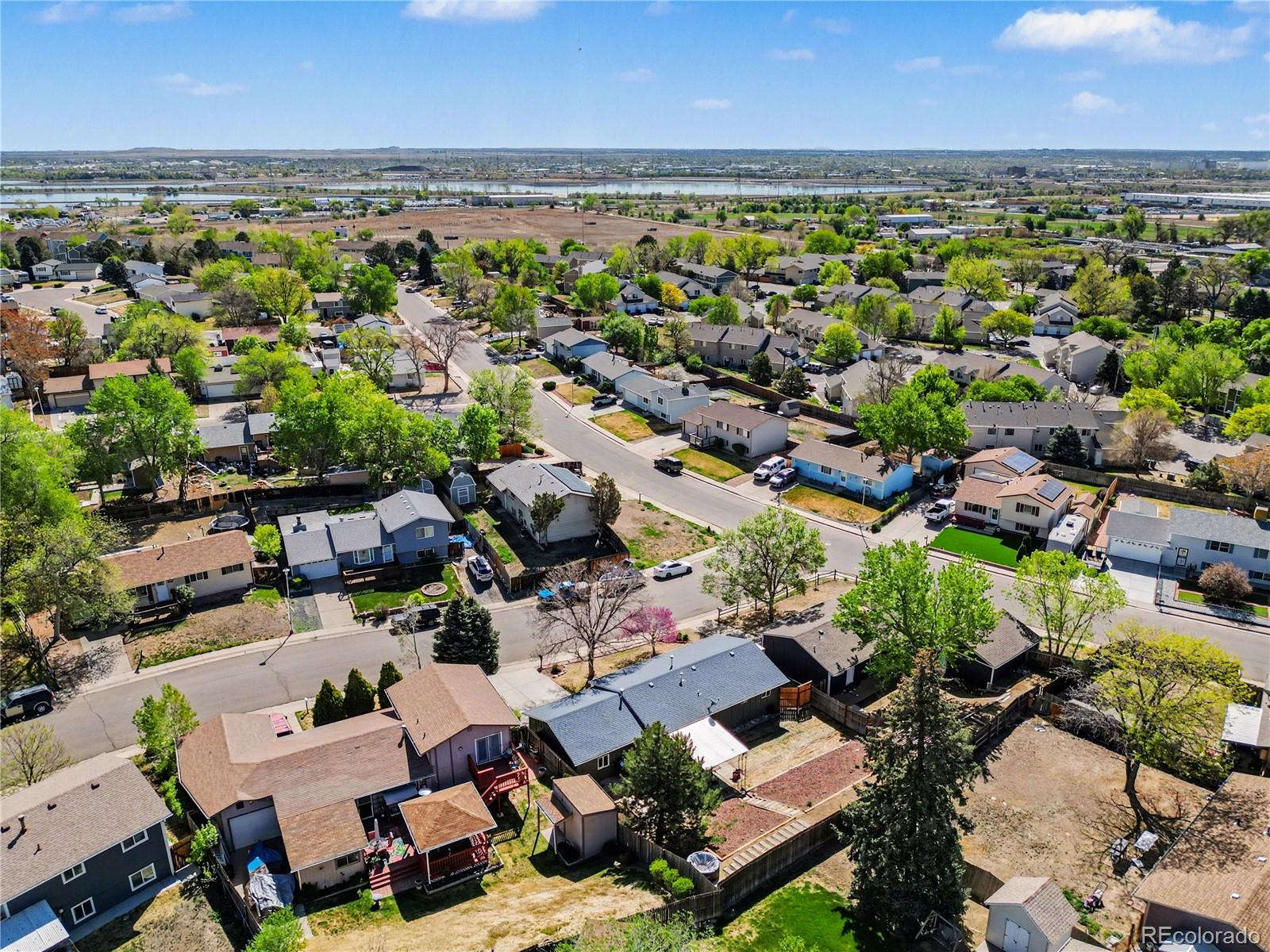 8207 High Street Denver, CO 80229 - Photo 23 of 31 an aerial view of a houses with outdoor space