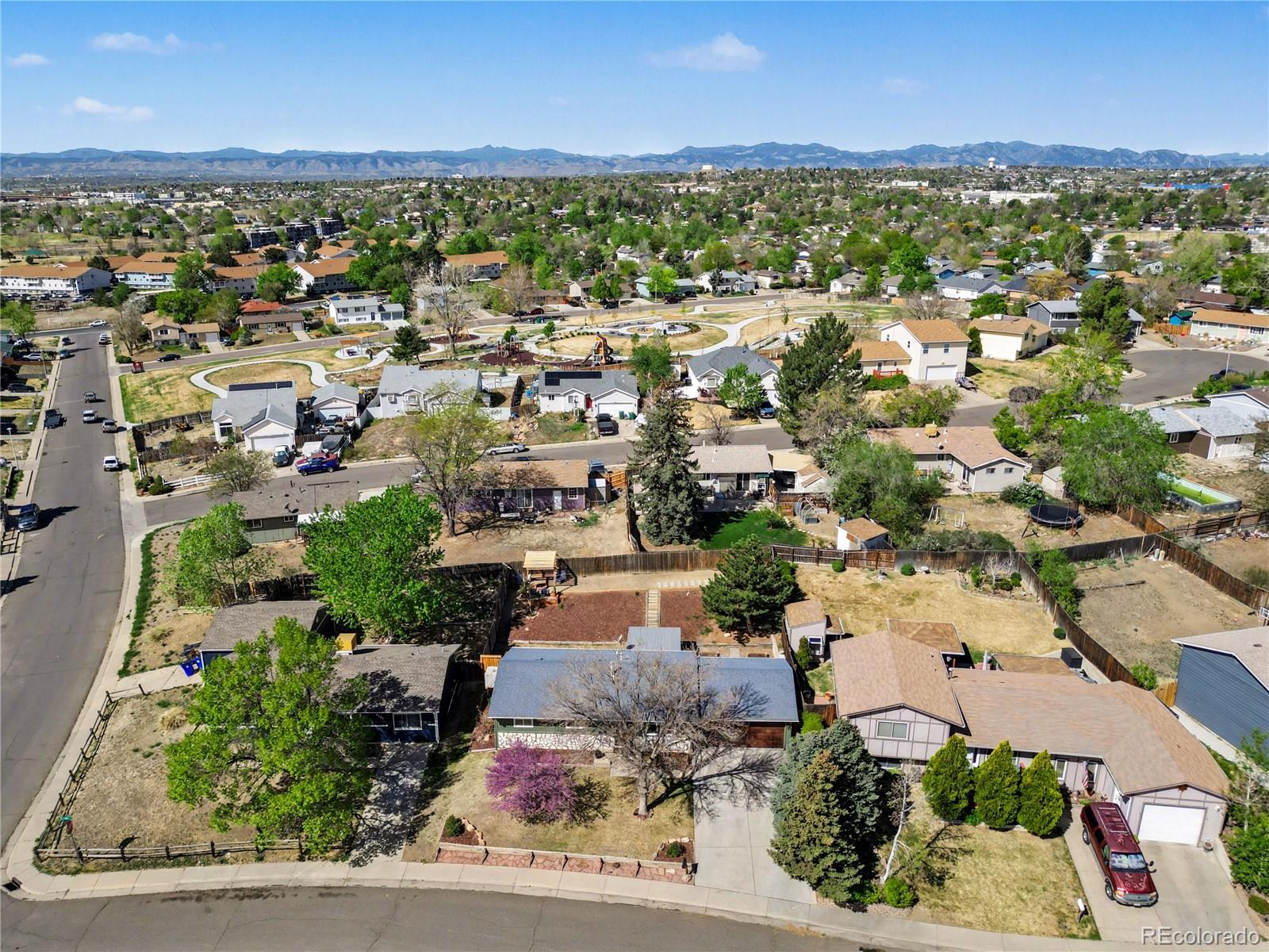 8207 High Street Denver, CO 80229 - Photo 25 of 31 an aerial view of residential houses with outdoor space and trees