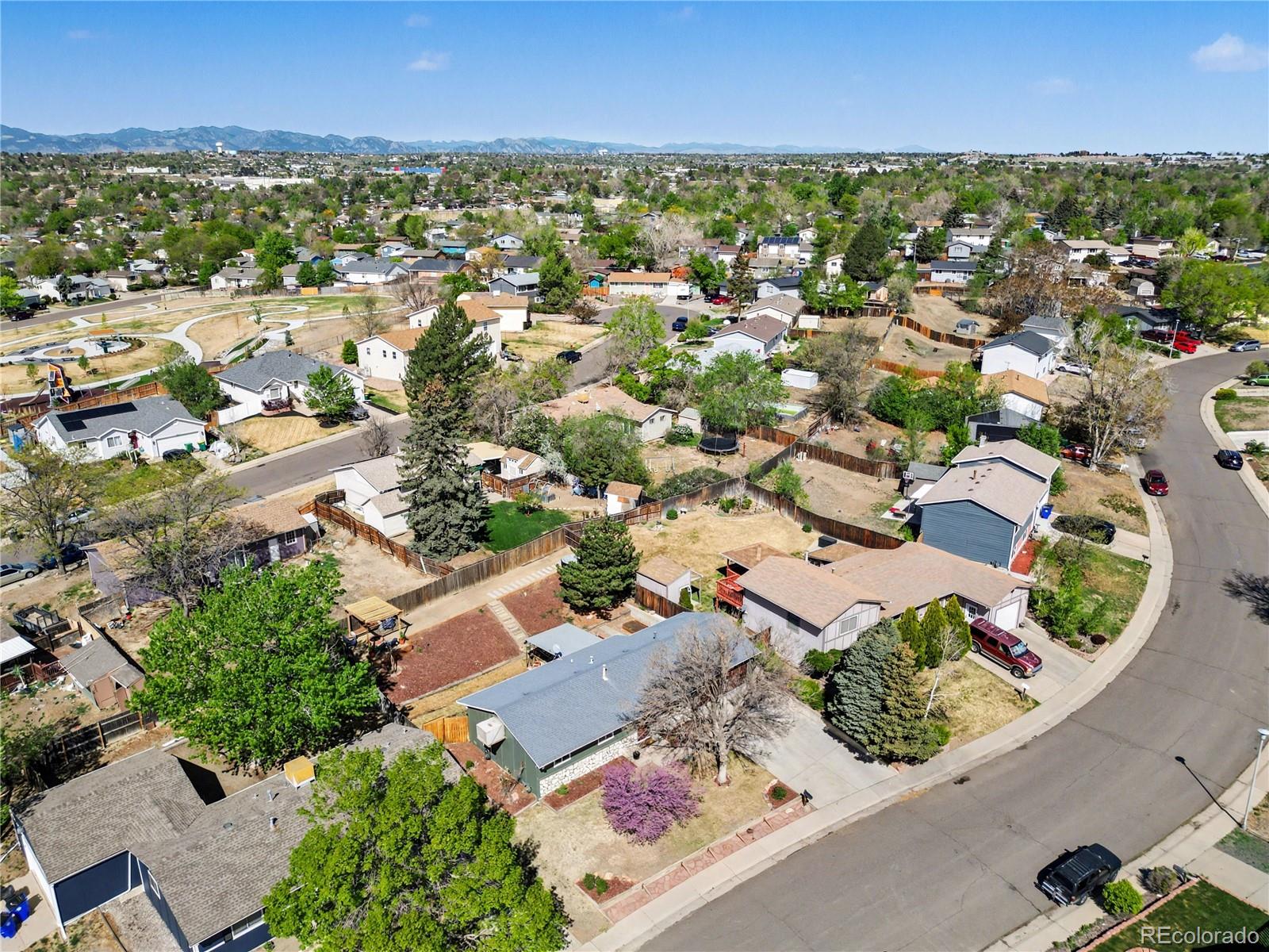 8207 High Street Denver, CO 80229 - Photo 26 of 31 an aerial view of residential houses with outdoor space