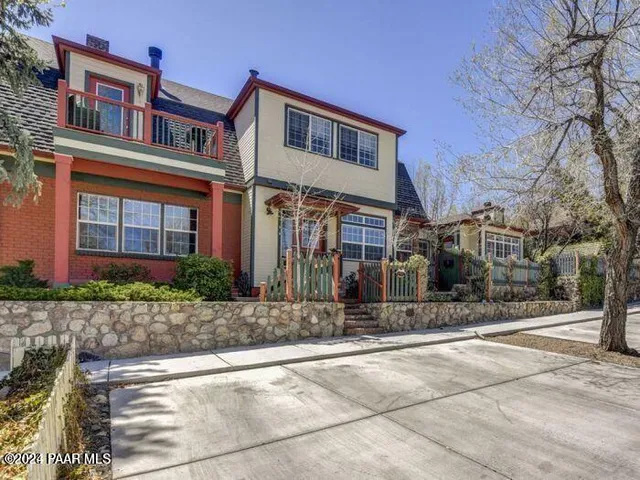 a front view of a house with garage