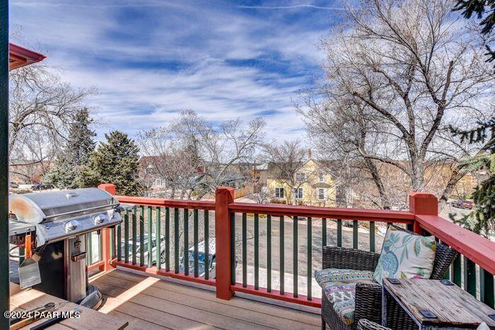 325 East E Union Prescott, AZ 86303 - Photo 12 of 13 a balcony with wooden floor and fence
