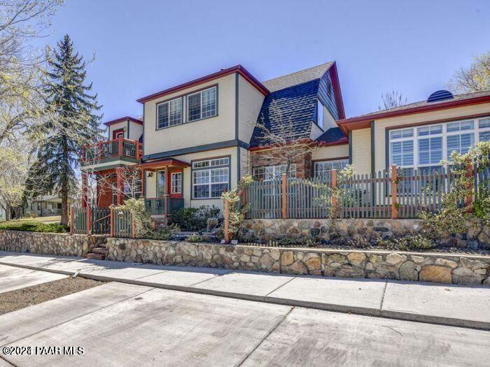 325 East E Union Prescott, AZ 86303 - Photo 4 of 13 a front view of a house with a yard