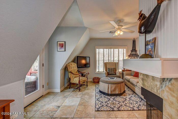 325 East E Union Prescott, AZ 86303 - Photo 5 of 13 a living room with furniture and a flat screen tv