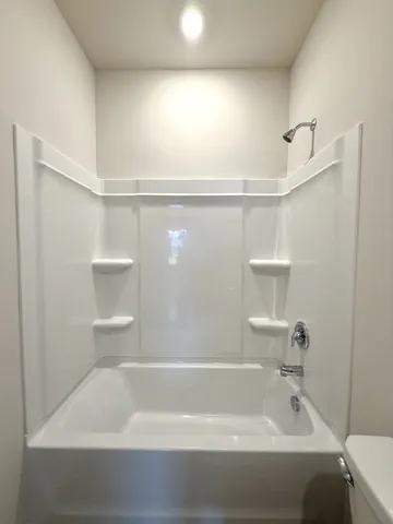 a bathroom with a bathtub
