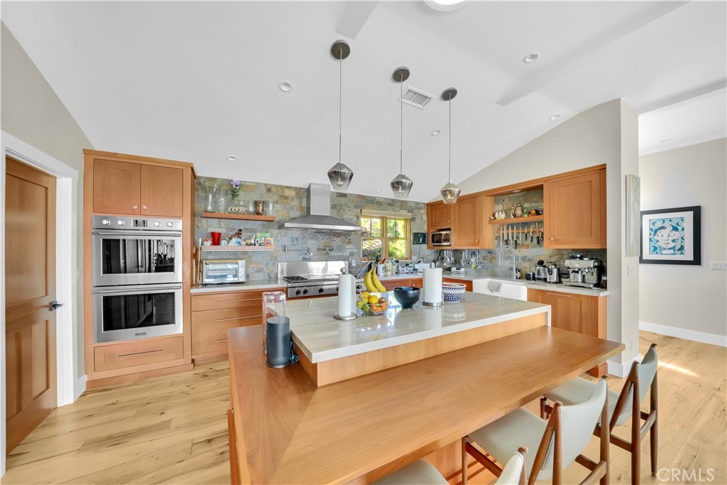 3064 Nestall Road Laguna Beach, CA 92651 - Photo 12 of 32 a view of a dining room kitchen counter top space and stainless steel appliances