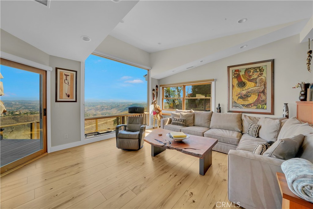 3064 Nestall Road Laguna Beach, CA 92651 - Photo 16 of 32 a living room with furniture and floor to ceiling window