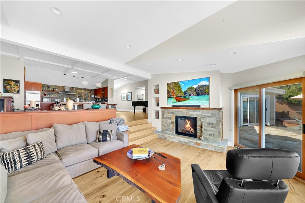 3064 Nestall Road Laguna Beach, CA 92651 - Photo 17 of 32 a living room with furniture and a fireplace