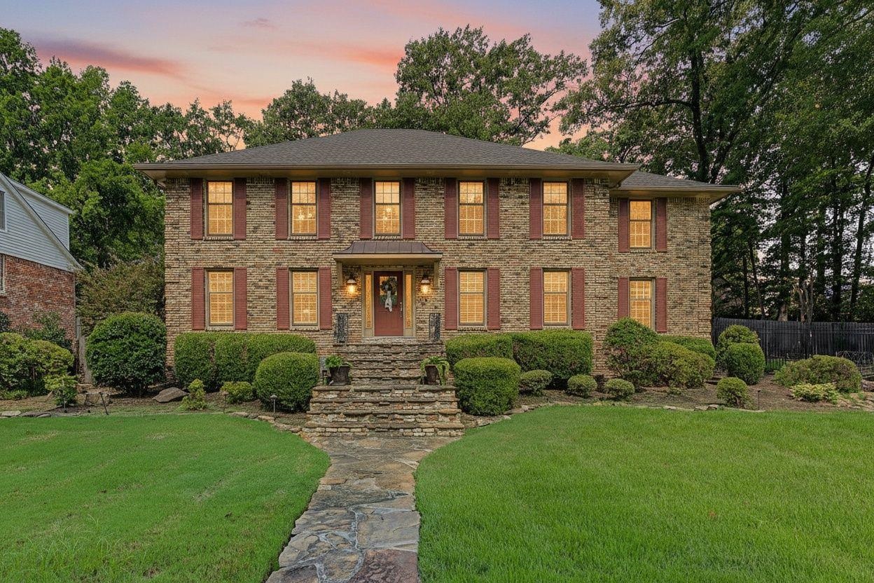 1929 Miller Farms Road Germantown, TN 38138 - Photo 2 of 40 Stone facade residence featuring a two-story design and red window shutters
