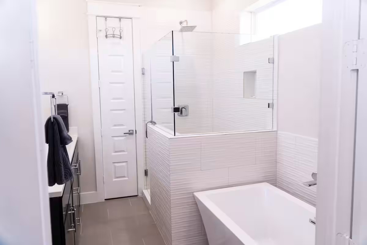 2105 Engelmohr Street, Unit A Houston, TX 77054 - Photo 11 of 16 a bathroom with a bathtub and a shower