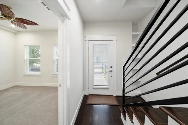 a kitchen with stainless steel appliances a sink stove and microwave