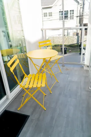a view of a kitchen with kitchen island a sink dishwasher and a stove