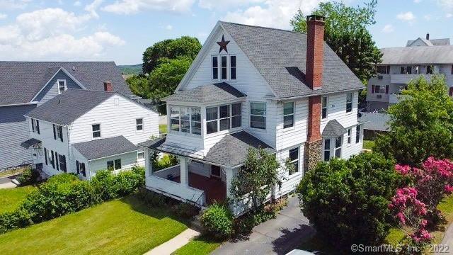 65 Chipman Street Waterbury, CT 06708 - Photo 1 of 1 aerial view of a house with a yard and potted plants