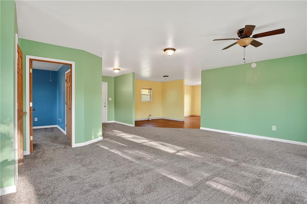 208 McCleary Road Aliquippa, PA 15001 - Photo 21 of 45 a view of a big room with closet and windows