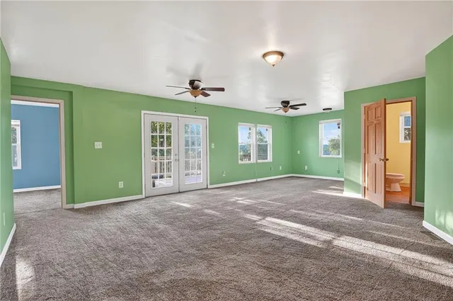 a view of a room with window and stairs