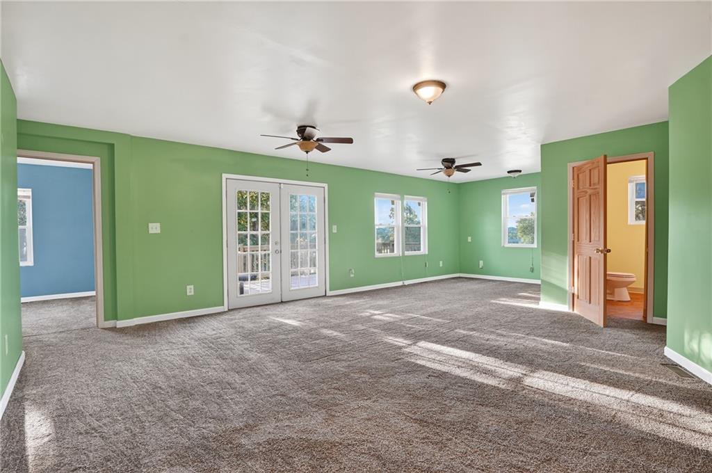 208 McCleary Road Aliquippa, PA 15001 - Photo 22 of 45 a view of a room with window and stairs