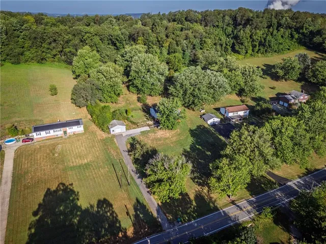 a view of a lake with a yard