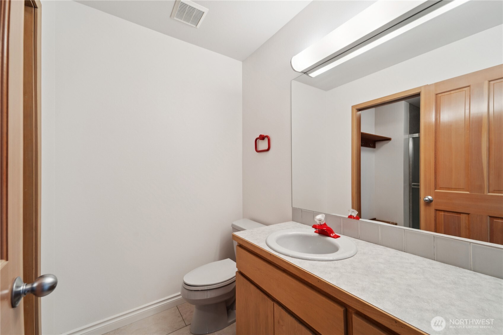 19749 53rd Avenue Northeast Lake Forest Park, WA 98155 - Photo 21 of 35 a bathroom with a sink and a mirror