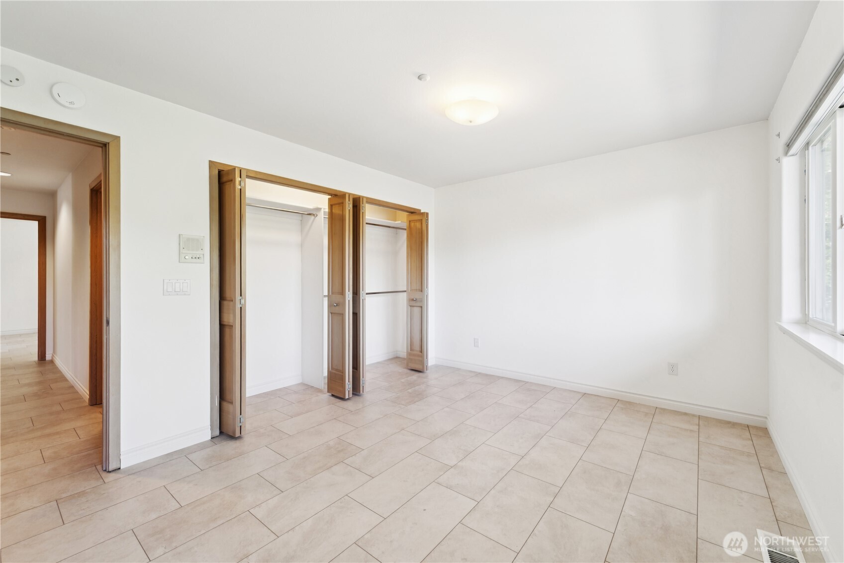19749 53rd Avenue Northeast Lake Forest Park, WA 98155 - Photo 25 of 35 an empty room with windows
