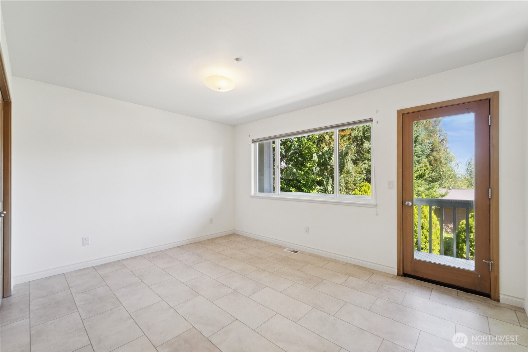 19749 53rd Avenue Northeast Lake Forest Park, WA 98155 - Photo 26 of 35 an empty room with windows