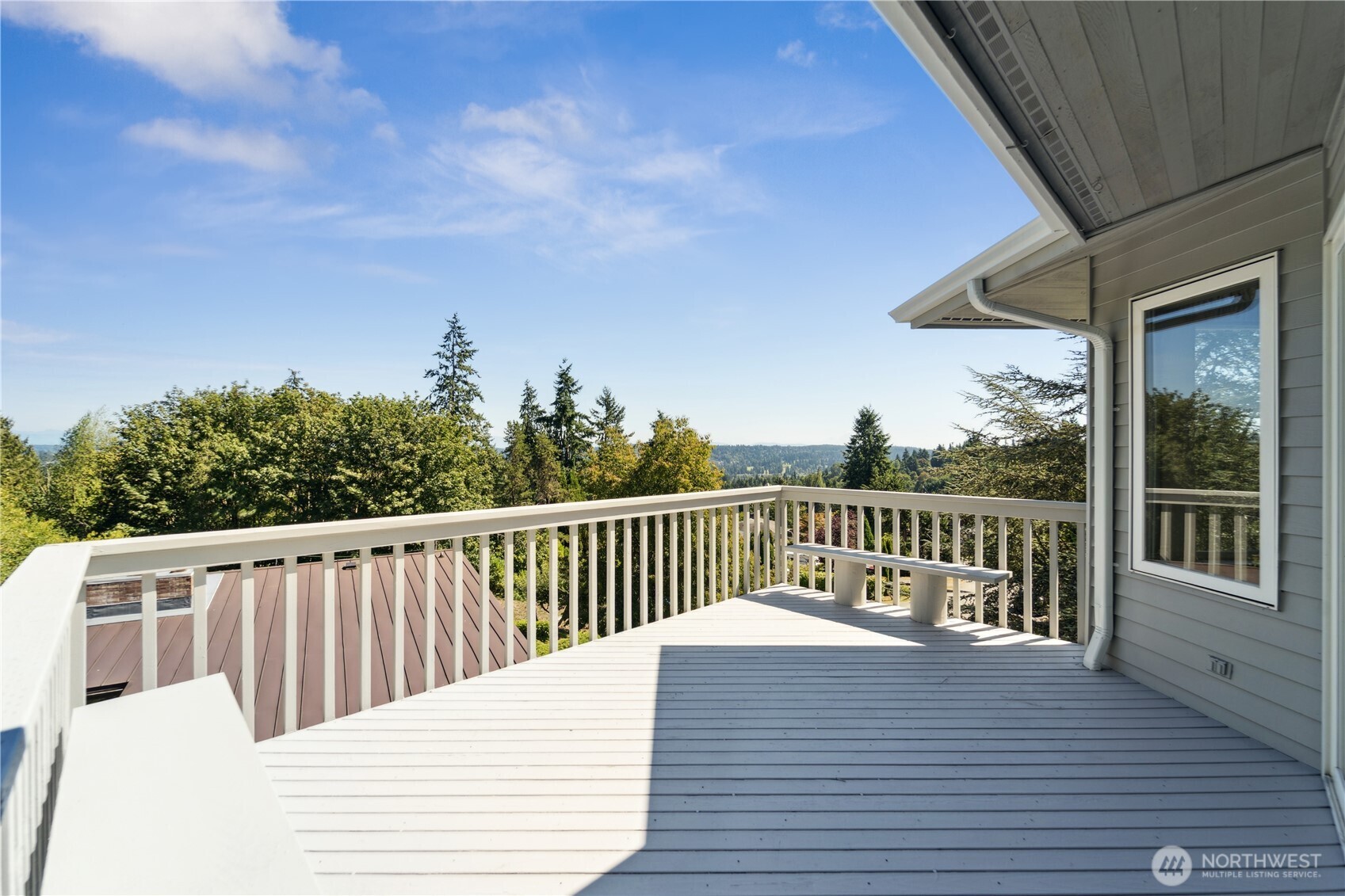 19749 53rd Avenue Northeast Lake Forest Park, WA 98155 - Photo 31 of 35 a balcony with wooden floor and fence
