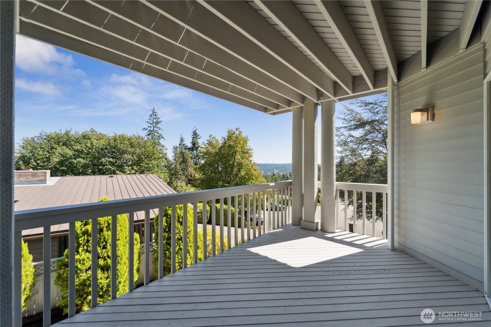 19749 53rd Avenue Northeast Lake Forest Park, WA 98155 - Photo 32 of 35 a view of balcony with wooden floor and fence