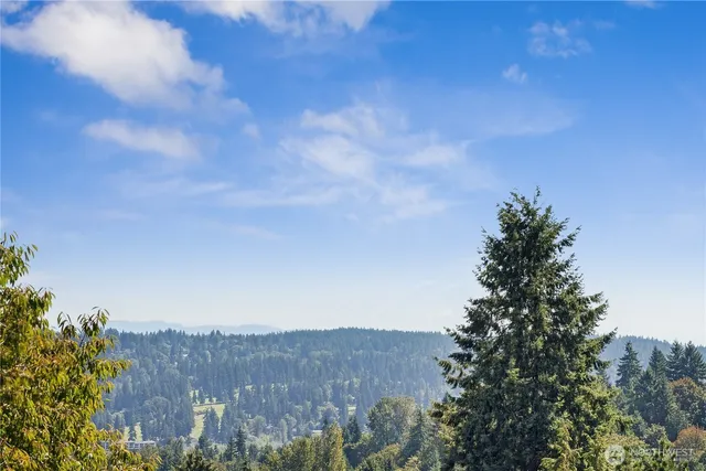 a view of balcony with wooden floor